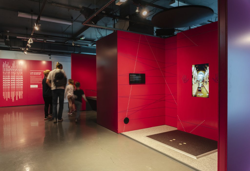 Visitors walking through Boom exhibition